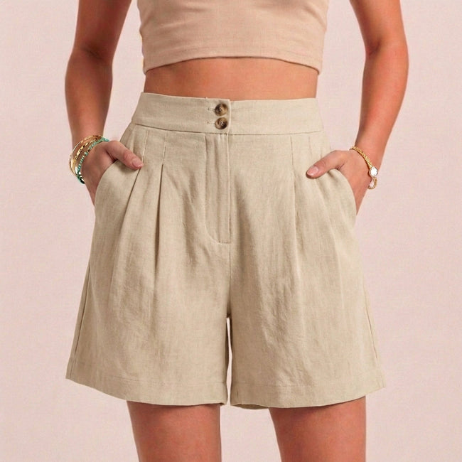 Apricot linen summer shorts for women by FJØRNA featuring high waist and breathable fabric with practical pockets.