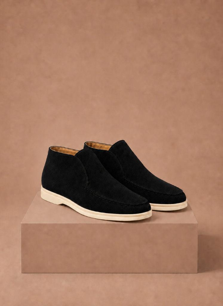 FJØRNA men's suede ankle loafers with moc toe design, ideal for smart casual style, shown on a model's feet.