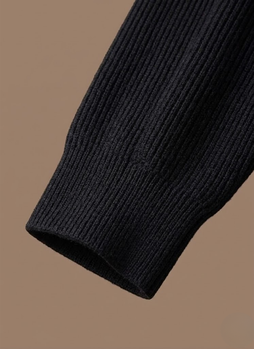 Men's breathable knit cardigan sweater by FJØRNA, showcasing a smart casual layered look with a cozy, textured knit design.