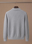 Men's breathable knit cardigan sweater by FJØRNA, showcasing a smart casual layered look in a soft, textured knit fabric.