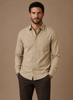 FJØRNA men's classic button-up shirt in relaxed fit, suitable for smart casual outfits, shown in a natural fabric and fit.