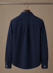 FJØRNA men's classic button-up shirt in relaxed fit, ideal for smart casual outfits, shown in a versatile design.