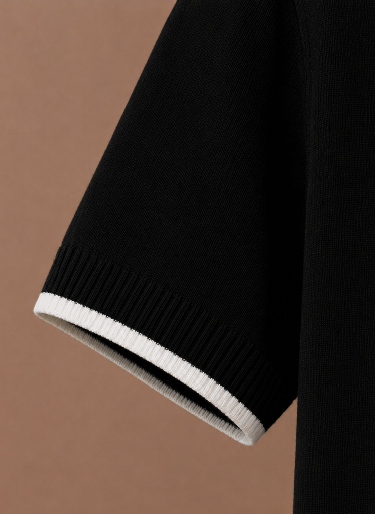 Men's slim fit polo shirt by FJØRNA with contrast trim, made of luxury cotton, showcasing a stylish and fitted design.