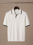 Men's slim fit polo shirt by FJØRNA featuring contrast trim, luxurious cotton fabric, and a tailored fit for a stylish look.