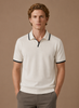 Men's slim fit polo shirt by FJØRNA featuring luxury cotton and contrast trim, shown in a stylish, fitted design.