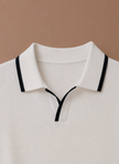 Men's slim fit polo shirt by FJØRNA featuring contrast trim, luxury cotton fabric, and a stylish, fitted design.