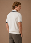 Men's slim fit polo shirt by FJØRNA with contrast trim, made of luxury cotton, shown in a stylish, close-up view.