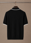 FJØRNA men's slim fit polo shirt with contrast trim in luxurious cotton, front view showing collar and short sleeves.