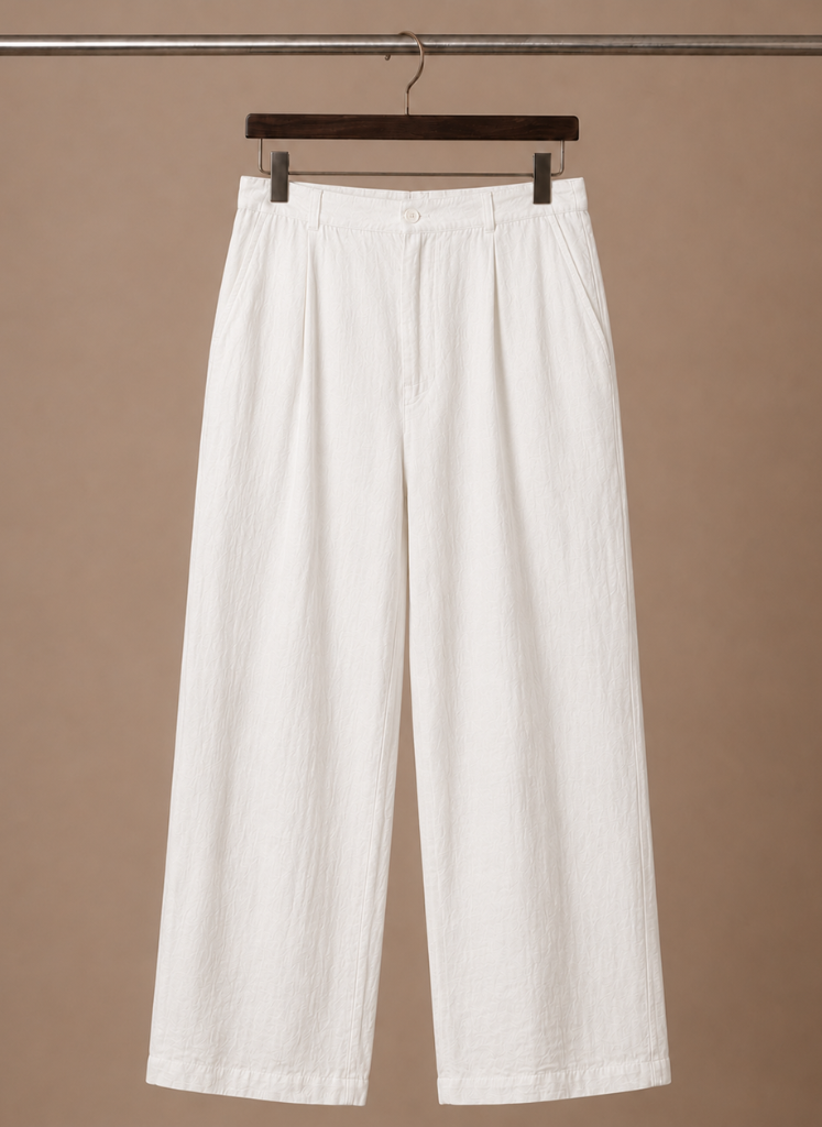 Men's relaxed fit linen cotton summer trousers by FJØRNA, shown in a natural beige color, casual and comfortable for warm weather.