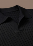 Men's FJØRNA ribbed knit polo shirt in lightweight fabric, ideal for summer casual wear, shown in a relaxed fit.