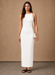 Women's slim fit textured sleeveless maxi dress by FJØRNA, perfect for summer, shown in a stylish, fitted design.
