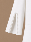 Women's slim fit midi dress by FJØRNA with pearl sleeve details and elegant split design.