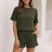 Army green women's two-piece knit co-ord set with pockets by FJØRNA, featuring a stylish and comfortable design.