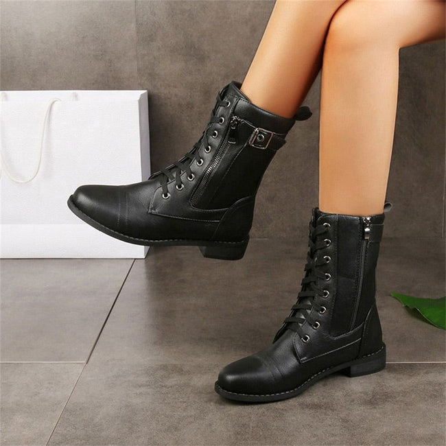 FJØRNA women's orthopedic boots with adjustable strap and zip-up closure, featuring supportive design and sturdy sole.