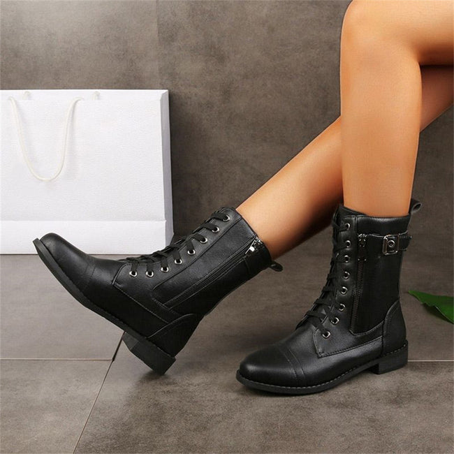 FJØRNA women's orthopedic boots with adjustable strap and zip-up closure, providing comfort and support for foot health.