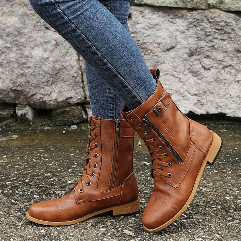 FJØRNA women's orthopedic boots with adjustable strap and zip-up closure, comfortable support footwear for women.