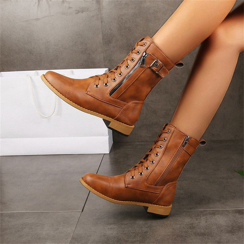 FJØRNA women's orthopedic boots with adjustable straps and zip-up closure, designed for comfortable support and style.