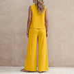 FJØRNA women's summer two-piece co-ord set with matching top and pants, featuring pockets, shown from the back.