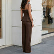 Back view of FJØRNA elegant two-piece women's co-ord set with wide-leg pants and fitted top in stylish fabric.