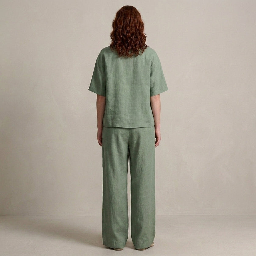 Back view of FJØRNA women's elegant two-piece drawstring co-ord set, featuring a stylish matching top and pants in a comfortable fit.
