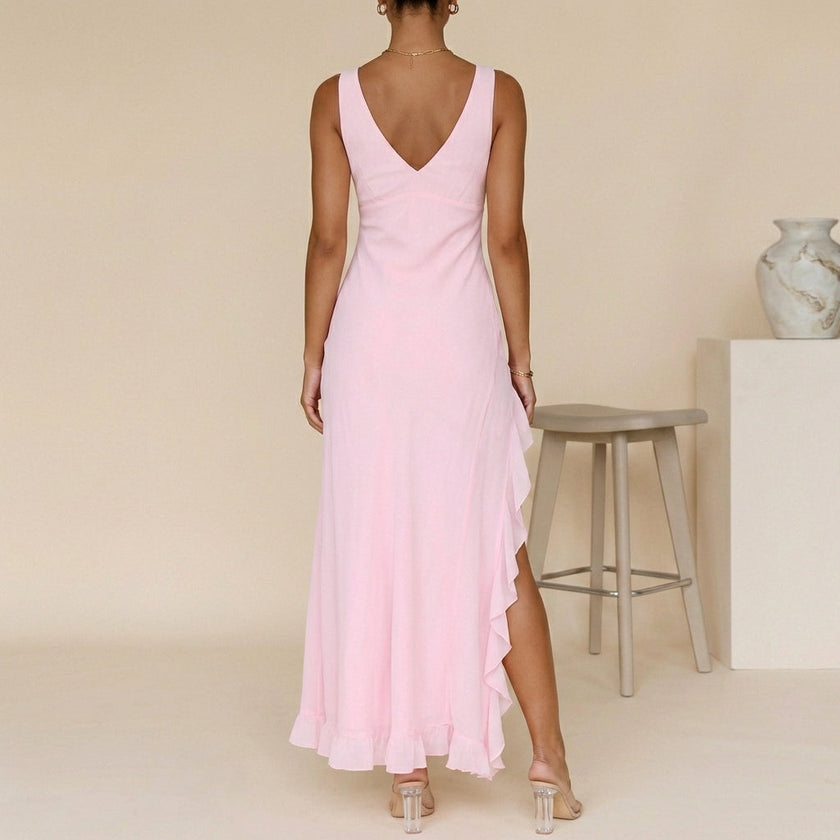 FJØRNA elegant women's maxi dress with V-neck and sleeveless design, shown from the back view. Perfect for summer occasions.