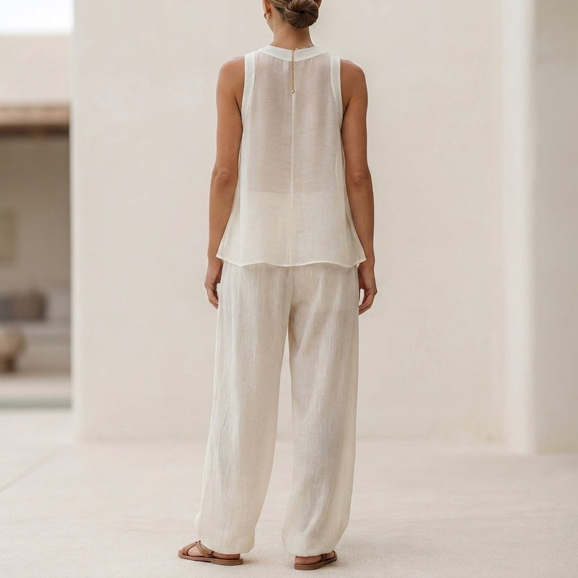 FJØRNA women's two-piece co-ord set with drawstring high neck, stylish back view of the elegant matching top and pants.