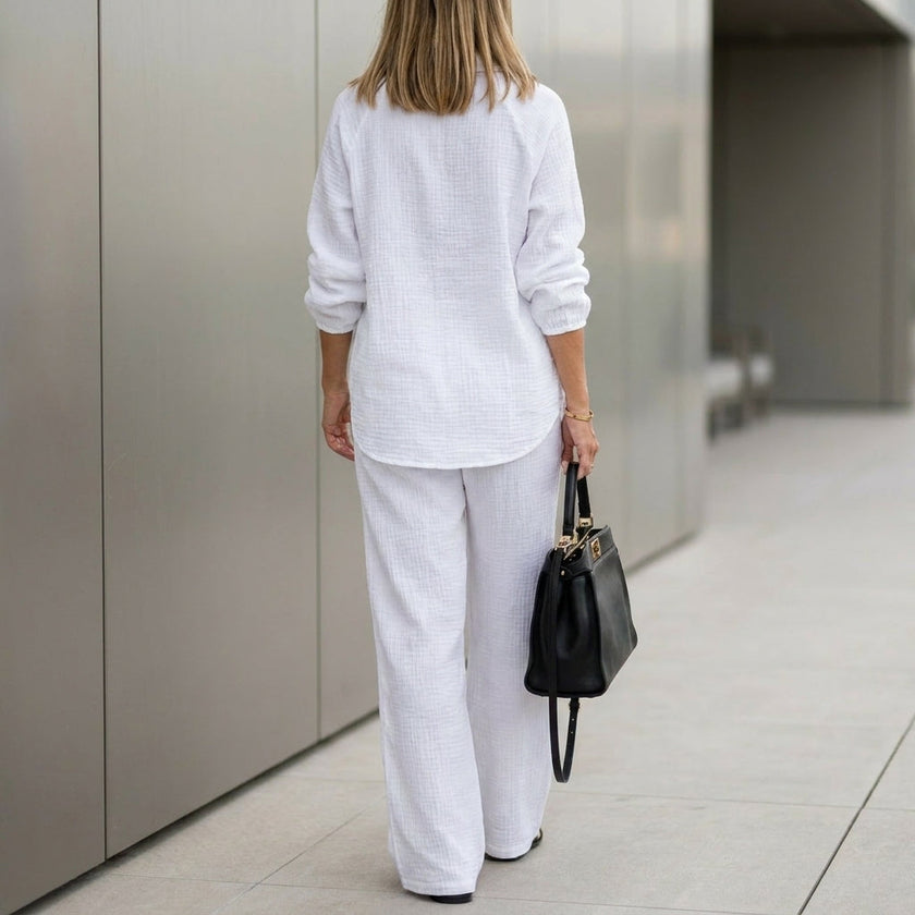 FJØRNA women's summer two-piece co-ord set with drawstring waist, relaxed fit, shown from the back in a casual outdoor setting.