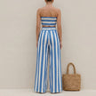 FJØRNA elegant two-piece women's co-ord set with striped pattern and ruched details, shown from the back.