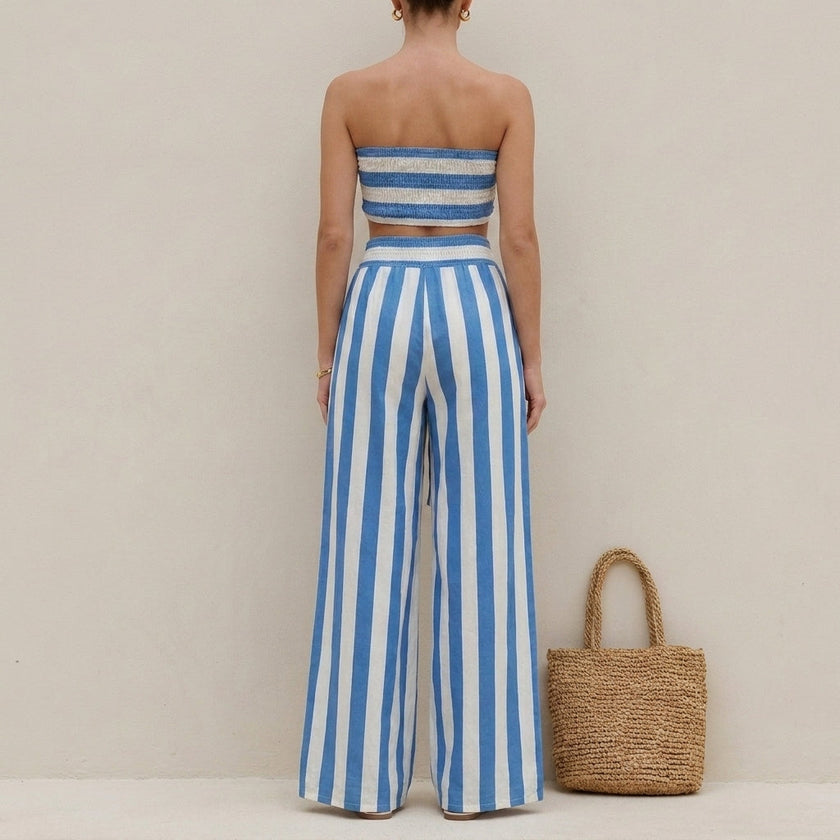 FJØRNA elegant two-piece women's co-ord set with striped pattern and ruched details, shown from the back.