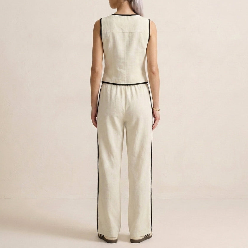 FJØRNA women's summer two-piece co-ord set with button-front top and matching shorts, shown from the back.