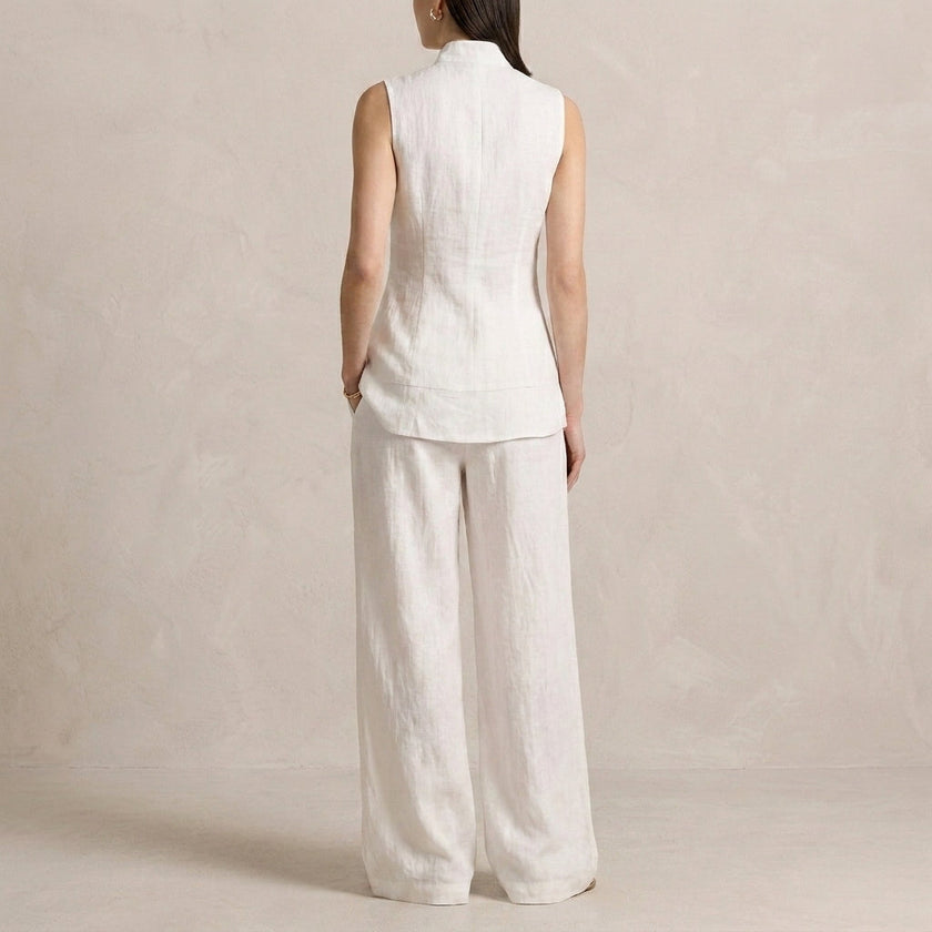 FJØRNA elegant two-piece women's co-ord set with asymmetric high neck, shown from the back in this stylish clothing image.