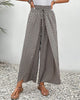 Beige FJØRNA women's lightweight summer trousers with wide leg design and breathable fabric, perfect for warm weather.
