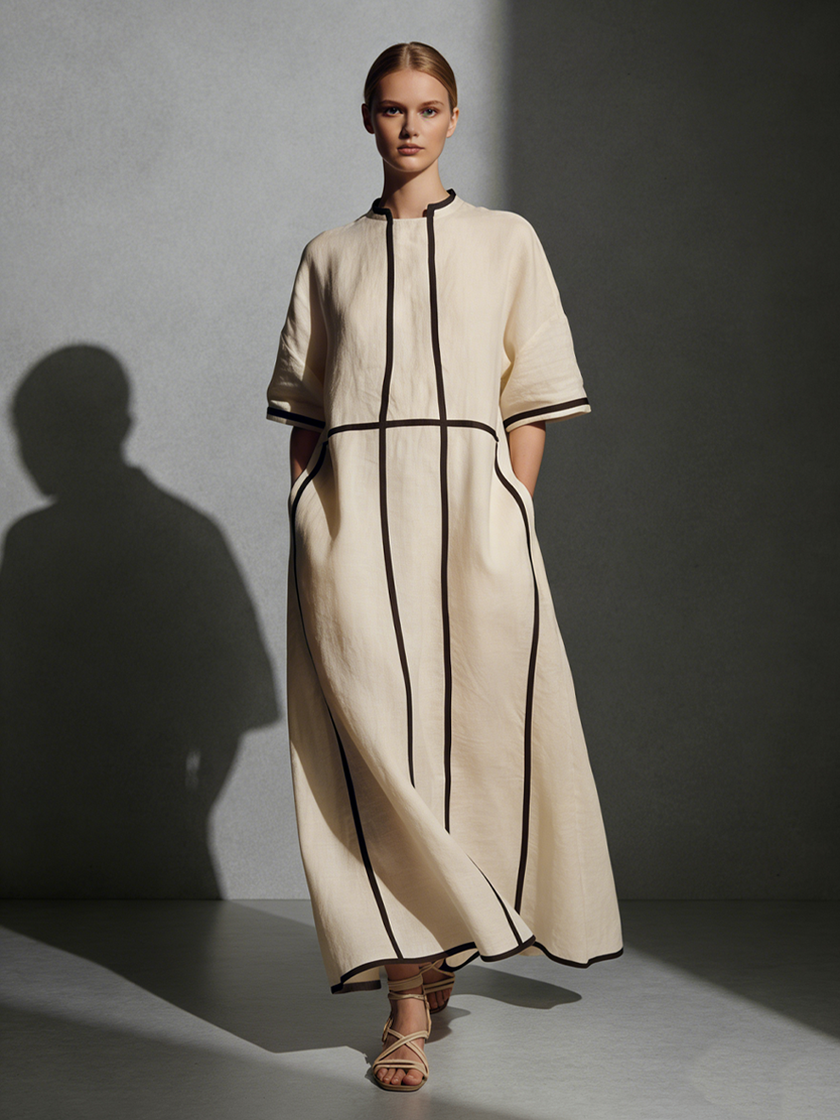 Beige linen maxi dress for women by FJØRNA, flowing long dress with a soft, lightweight fabric and subtle waist detail.