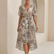 Beige FJØRNA women's elegant midi dress with V-neck, short sleeves, and wrap design, perfect for sophisticated occasions.