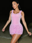 FJØRNA Bimbocore women's mini dress featuring a stylish party and daywear design, shown in a vibrant and trendy style.