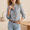 Black linen ruffle trim blouse for women by FJØRNA, showcasing elegant ruffle details and a stylish, comfortable fit.