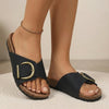 FJØRNA black orthopedic cork slide sandals with open toe and adjustable buckle, designed for comfort and support.