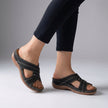 Black FJØRNA orthopedic open toe wedge sandals with T-strap and rhinestone accents, showcasing a stylish and supportive footwear design.