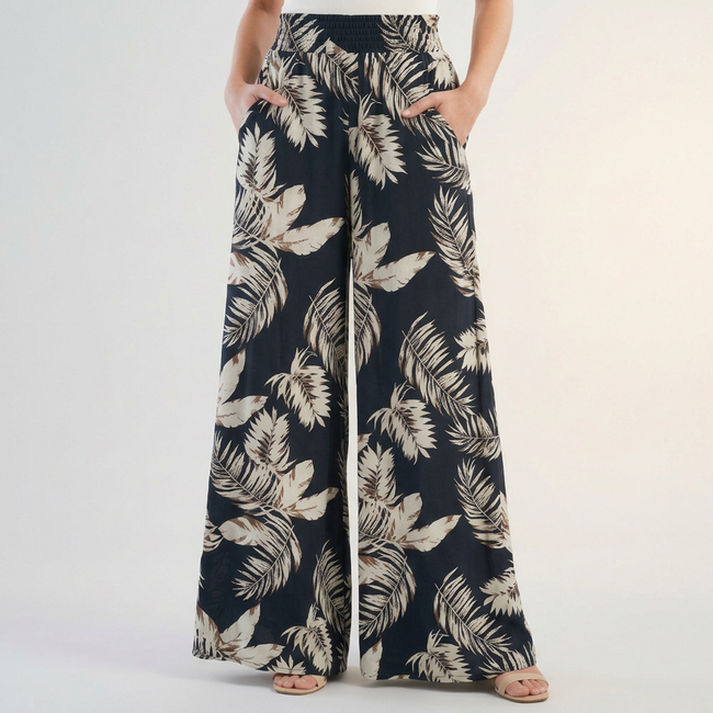 Black women’s summer trousers by FJØRNA featuring cotton fabric and ruched details for a stylish, comfortable look.