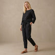 Black linen two-piece women's co-ord set with pockets by FJØRNA, featuring a stylish top and matching pants.