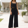Black women's summer two-piece linen co-ord set with pockets by FJØRNA, featuring a stylish top and matching shorts.