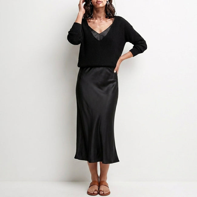Black satin two-piece women's co-ord set by FJØRNA, flowing and elegant with a stylish, relaxed fit.