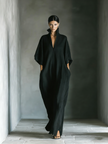 Black cotton maxi dress for women by FJØRNA, flowing long dress with a relaxed fit and sleeveless design.