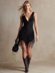 Black faux suede V-neck mini dress by FJØRNA, casual dress with long sleeves and fitted silhouette, displayed on a mannequin.