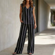 Black FJØRNA two-piece women's co-ord set with striped pattern and wide-leg pants, stylish and elegant for casual or dressy occasions.
