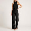 Black FJØRNA women's two-piece set with pleated halter neck, featuring a stylish and elegant co-ord outfit.