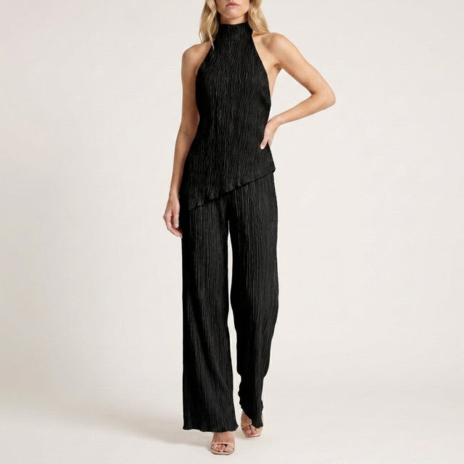 Black FJØRNA women's two-piece set with pleated halter neck, featuring a stylish and elegant co-ord outfit.