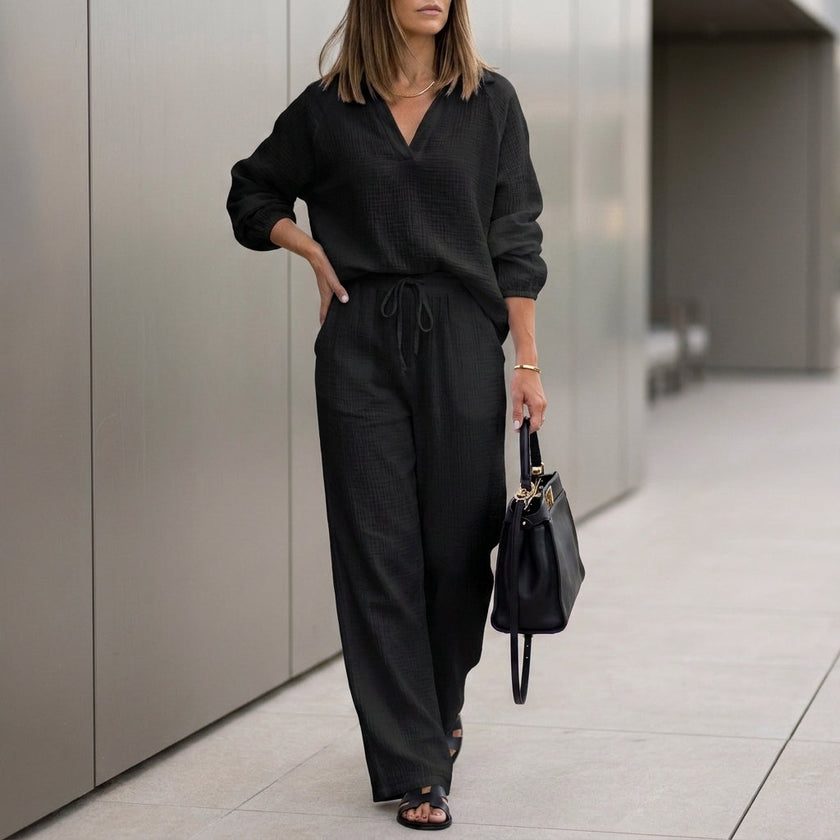 Black women's summer two-piece co-ord set by FJØRNA featuring a relaxed fit and drawstring details.