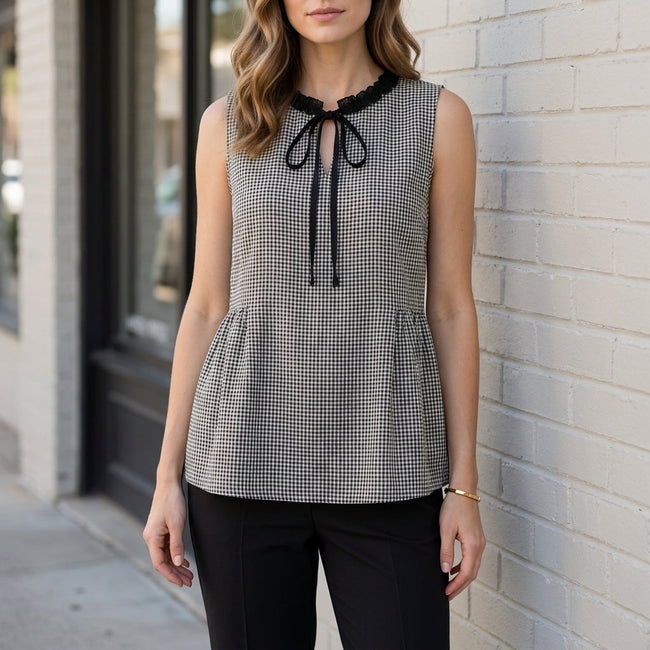 Black Gingham sleeveless summer blouse for women by FJØRNA, featuring a stylish and breathable top in a classic pattern.