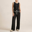 Black FJØRNA women's summer two-piece co-ord set with button-front top and matching shorts, casual and stylish for warm weather.